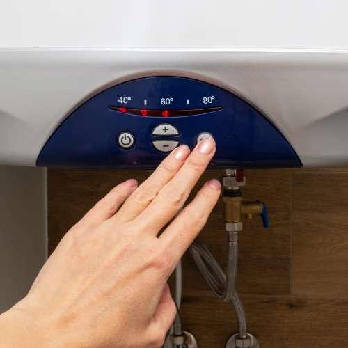 Wall-mounted gas hot water system with compact design