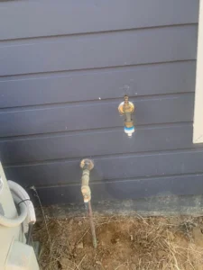 EVR Plumbing external water tap connection integrated with septic tank and wastewater treatment plumbing system