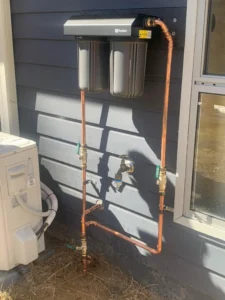 EVR Plumbing home water filtration system connected to septic tank and wastewater treatment plumbing setup
