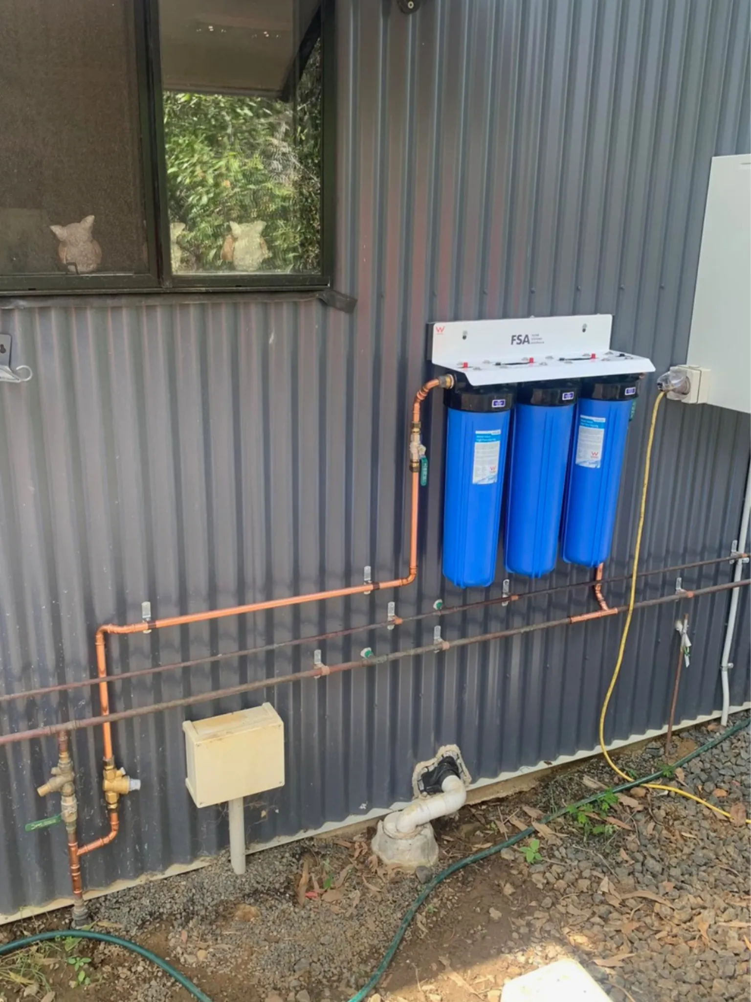 EVR Plumbing whole house water filtration system installed for septic tank and wastewater treatment property protection